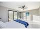 Bright bedroom with sliding glass doors at 3636 Mineola, Sarasota, FL 34239