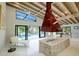 Open-concept living area with view of pool area at 3636 Mineola, Sarasota, FL 34239