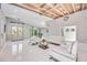 Spacious living room with white decor, modern furnishings, and a bright, airy atmosphere at 3636 Mineola, Sarasota, FL 34239