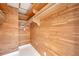 Cedar-lined walk-in closet providing ample storage with custom shelving and wooden accents at 3636 Mineola, Sarasota, FL 34239