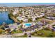 Aerial view of community amenities including a pool, clubhouse, tennis, and a putting green in a charming neighborhood at 4414 Mount Vernon Dr # 1, Bradenton, FL 34210