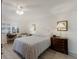 Bright bedroom with white walls, a comfortable bed, and a peaceful ambiance for relaxation at 4414 Mount Vernon Dr # 1, Bradenton, FL 34210