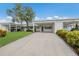 Charming single-story home with covered carport and landscaped lawn, a welcoming facade at 4414 Mount Vernon Dr # 1, Bradenton, FL 34210