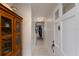 Bright hallway with tile flooring, bi-fold closet, and a glimpse into the living area at 4414 Mount Vernon Dr # 1, Bradenton, FL 34210