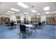 Inviting library room featuring ample seating, bookshelves, and natural light at 4414 Mount Vernon Dr # 1, Bradenton, FL 34210