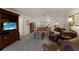An inviting living area featuring comfortable leather seating, wood floors and access to other spaces at 4414 Mount Vernon Dr # 1, Bradenton, FL 34210