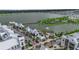Stunning aerial view of the community, showcasing its waterfront location, amenities, and beautifully designed buildings at 4728 Old Blush St, Bradenton, FL 34211
