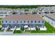 Overhead view of townhome showing private back patios with landscaping and community at 4728 Old Blush St, Bradenton, FL 34211