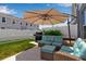 Outdoor living space with comfortable patio furniture and grill, perfect for relaxing and entertaining at 4728 Old Blush St, Bradenton, FL 34211