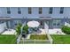 Private backyard with lounge seating, grill, and white picket fence at 4728 Old Blush St, Bradenton, FL 34211