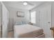 Cozy bedroom featuring a comfortable bed, ceiling fan, and neutral decor at 4728 Old Blush St, Bradenton, FL 34211