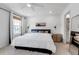 Spacious bedroom featuring lots of natural light, neutral walls, carpeted floors, and ensuite bathroom at 4728 Old Blush St, Bradenton, FL 34211