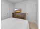 Bedroom featuring a dresser and TV at 4728 Old Blush St, Bradenton, FL 34211