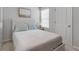 Cozy bedroom featuring a comfortable bed, and neutral decor at 4728 Old Blush St, Bradenton, FL 34211