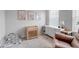 Bright Bedroom with crib, and chair, creating a welcoming space for a  at 4728 Old Blush St, Bradenton, FL 34211