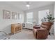 Bright Bedroom with crib, chair, and large windows for ample natural light at 4728 Old Blush St, Bradenton, FL 34211