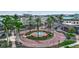 Charming town center showcasing a fountain, palm trees, and boutique shops at 4728 Old Blush St, Bradenton, FL 34211