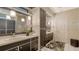Bright bathroom with dual vanities, modern fixtures, and ample storage cabinets at 4761 Pine Harrier Dr, Sarasota, FL 34231