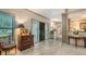 Welcoming foyer with tile flooring, decorative front door, and classic decor at 4761 Pine Harrier Dr, Sarasota, FL 34231
