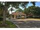 The Landings guard house at the entrance framed by trees at 4761 Pine Harrier Dr, Sarasota, FL 34231