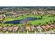 Aerial view of the property showing its location near a golf course and picturesque community lakes at 5104 Benito Ct, Bradenton, FL 34211