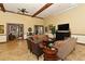 Relaxing lounge area with comfortable seating and stylish decor, perfect for socializing and unwinding at 5104 Benito Ct, Bradenton, FL 34211