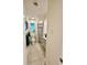 Hall bathroom featuring tile floors, a window and a walk-in shower at 5350 Barbarossa Ave, Sarasota, FL 34235