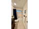 Bathroom with a vanity sink, a large mirror, and shower-tub combo at 5350 Barbarossa Ave, Sarasota, FL 34235