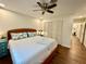 Inviting bedroom featuring hardwood floors, a ceiling fan, and a bright, airy atmosphere at 5350 Barbarossa Ave, Sarasota, FL 34235
