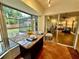 Bright breakfast nook with views of backyard and seamless transition to indoor living space at 5350 Barbarossa Ave, Sarasota, FL 34235