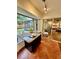 Granite countertop breakfast nook open to main bedroom and with views of backyard at 5350 Barbarossa Ave, Sarasota, FL 34235