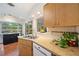 Bright kitchen featuring ample counter space and a garden view at 5350 Barbarossa Ave, Sarasota, FL 34235