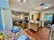 Open kitchen view with a breakfast nook, stainless steel sink, and breakfast nook at 5350 Barbarossa Ave, Sarasota, FL 34235