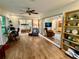 Spacious living room with wood floors and view of bedroom and den at 5350 Barbarossa Ave, Sarasota, FL 34235