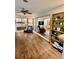 Cozy living room with wood floors and view of bedroom at 5350 Barbarossa Ave, Sarasota, FL 34235