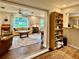 Open floor plan with the living room connected to the dining room and kitchen at 5350 Barbarossa Ave, Sarasota, FL 34235