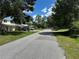 Quiet street view showcases the homes in a tranquil residential neighborhood at 5350 Barbarossa Ave, Sarasota, FL 34235