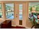 Inviting sunroom with multiple windows for plenty of natural light and a sliding door for easy access at 5350 Barbarossa Ave, Sarasota, FL 34235