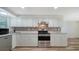 Updated kitchen offering stainless steel appliances, and stylish cabinetry for a modern, functional cooking space at 5438 Potter St, Sarasota, FL 34232