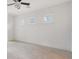 Bedroom with carpet, white trim, and windows with blinds at 6050 Saddle Oak Trl, Sarasota, FL 34241