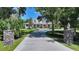Stunning estate with long driveway, lush lawn, mature trees, and timeless curb appeal at 6050 Saddle Oak Trl, Sarasota, FL 34241
