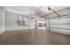 Spacious garage with room for multiple cars and storage, plus convenient access to the house at 6050 Saddle Oak Trl, Sarasota, FL 34241