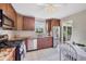 Well-lit kitchen featuring stainless steel appliances, breakfast nook, and ample cabinet storage at 6188 80Th N St # 102, St Petersburg, FL 33709