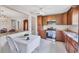 Charming kitchen with stainless appliances, granite counters, breakfast bar, and tile floors at 6188 80Th N St # 102, St Petersburg, FL 33709