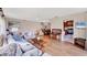 Spacious living room featuring hardwood floors, neutral walls, and comfortable seating arrangements at 6188 80Th N St # 102, St Petersburg, FL 33709