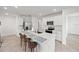 Modern kitchen with stainless steel appliances, a center island, and ample counter space at 6612 Silverstar Dr, Sarasota, FL 34240