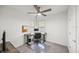 Bright office with a desk, computer and modern ceiling fan at 6612 Silverstar Dr, Sarasota, FL 34240