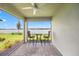 Cozy patio with comfortable seating and stunning lake views to enjoy outdoor living at 6612 Silverstar Dr, Sarasota, FL 34240