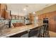 Beautiful kitchen features granite countertops, a breakfast bar and updated appliances at 6905 Pine Valley St, Bradenton, FL 34202