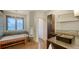 This main bathroom has dual sink vanities, a soaking tub under a window, and a separate water closet at 6905 Pine Valley St, Bradenton, FL 34202